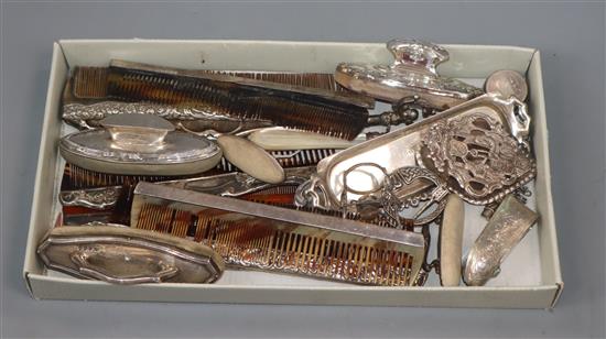 A group of small silver/white metal including, mounted combs, nail buffers, butter knife, miniature trays, pill boxes etc.